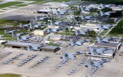 The Geer Services Team Installs Large Photo of F-18s Over Cecil Field at the National POW/MIA Memorial & Museum